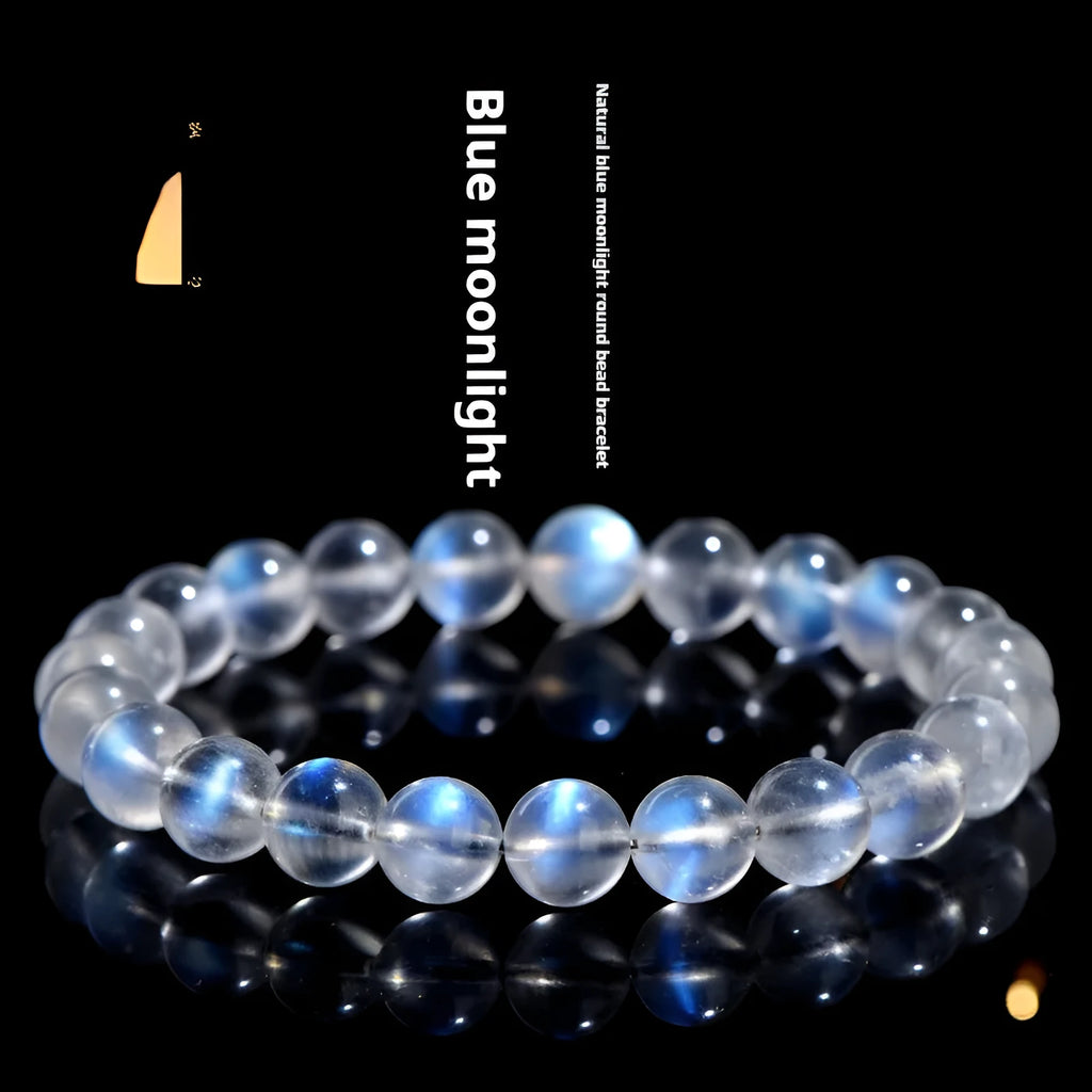 Natural cream body blue moonlight crystal bracelet with matte finish on a wrist.