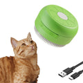 Green rechargeable cat steam brush with silicone bristles and steam activation button