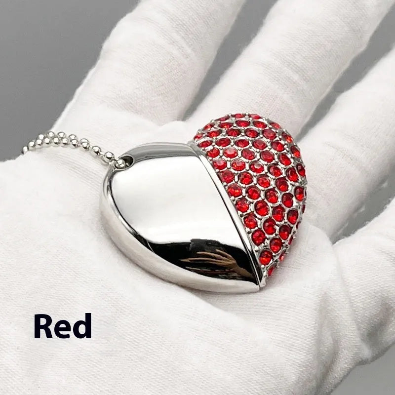 Blue heart-shaped USB flash drive with brick-inlaid pattern on metal body, showing USB connector.