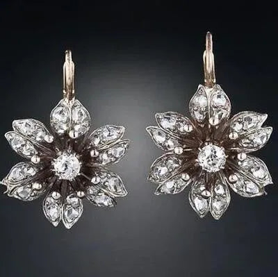 Silver retro fashion creative female earrings with alloy electroplated construction