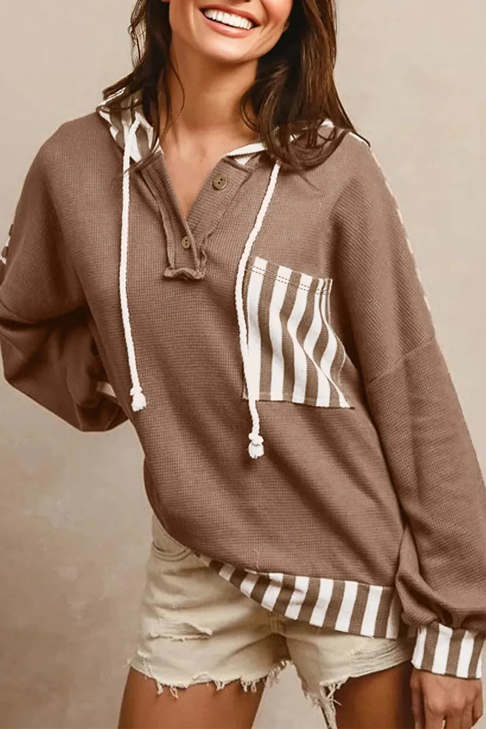 Straw yellow waffle texture striped hoodie with patchwork panels and button neck closure