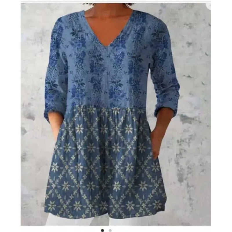 Women's printed loose dress with 3/4 sleeves and a wave skirt, shown in a variety of pattern styles.