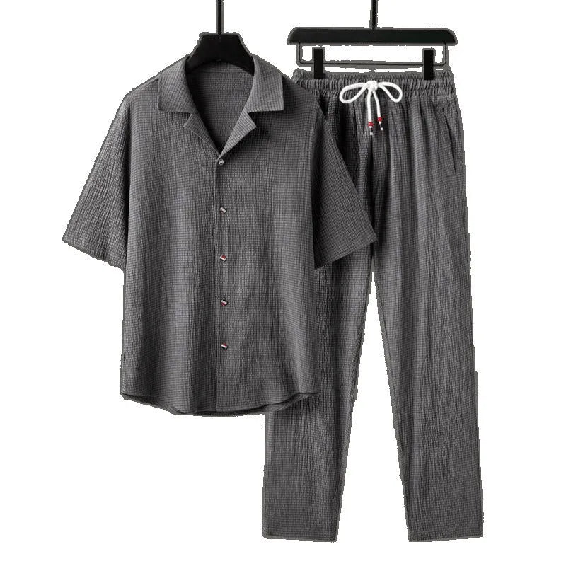 Casual men's Chinese style two-piece set with short-sleeved top and trousers in polyester with wool lining, white suit colour option