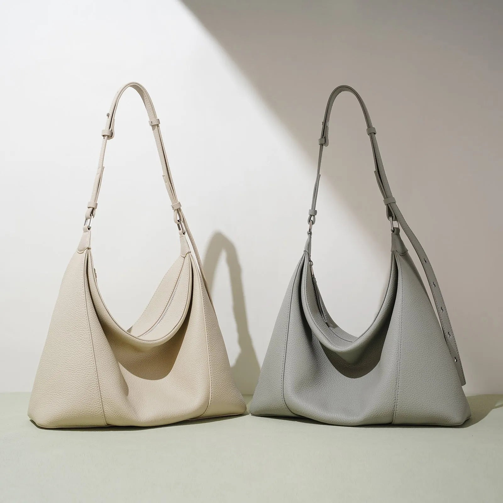 First layer cowhide soft leather shoulder bag in beige with pillow shape and open outer pocket