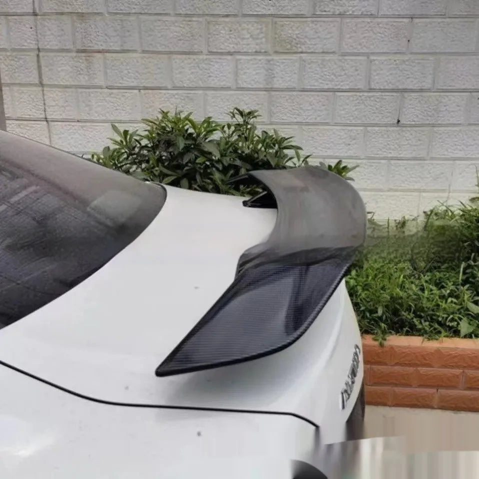 Universal punch-free car spoiler in ABS plastic for exterior modification, shown in available finishes.