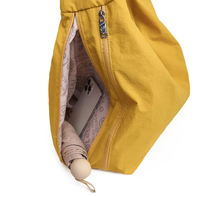 Women's heart-shaped nylon underarm bag in black, yellow, khaki and blue colour options