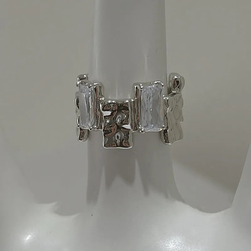 Open geometric silver ring with cross zircon pattern in retro style