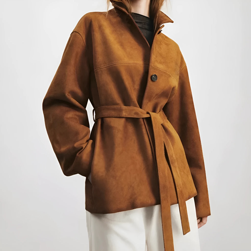 Women's loose-fit caramel mocha cashmere coat with a Peter Pan collar belt and leather stitching.