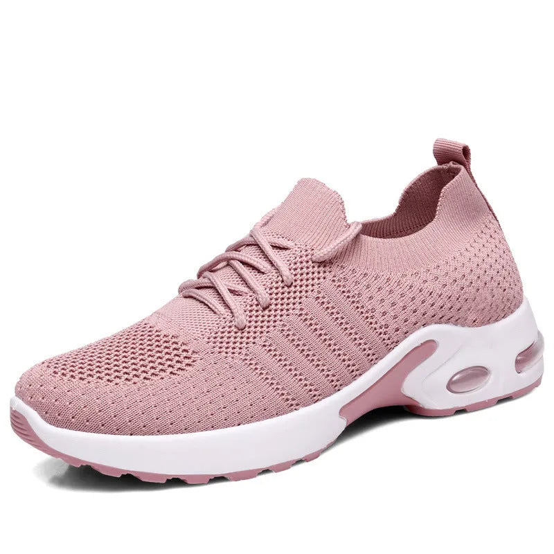 Women's black mesh lace-up sneakers with a round toe and soft PVC sole on a white background.