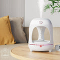 Anti gravity levitating water drops ultrasonic humidifier with LED night light in rose gold and white colour on a desk