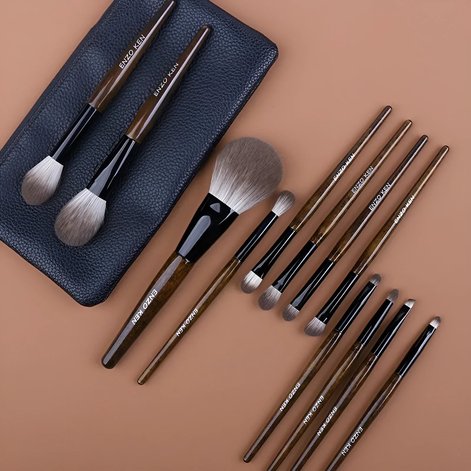 12-piece makeup brush set with wooden handles in a black PU zip-up case.