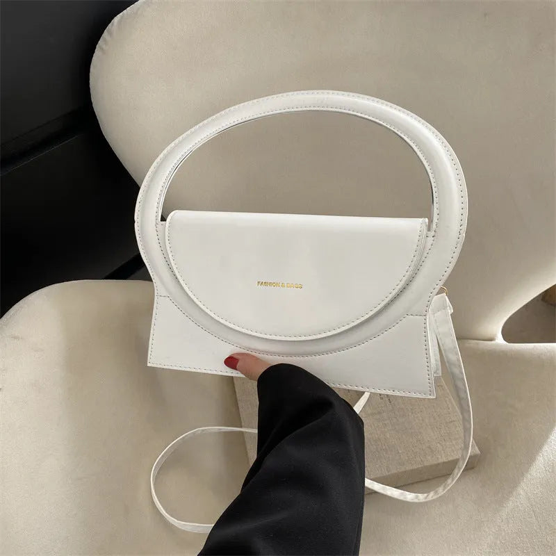 Horizontal square PU leather messenger bag with stitching detail and internal phone pocket