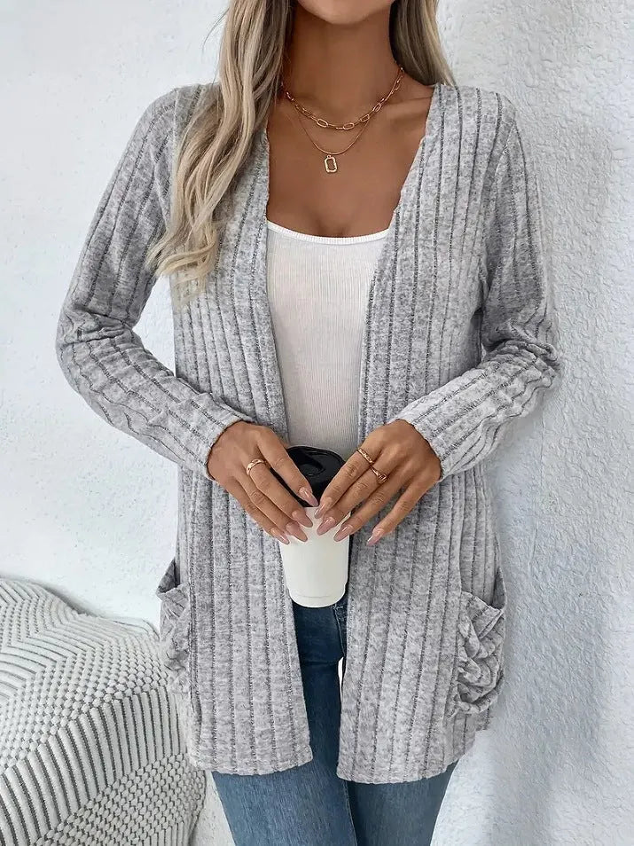 Men's solid colour long sleeve cardigan with front pockets in loose fit polyester knitwear