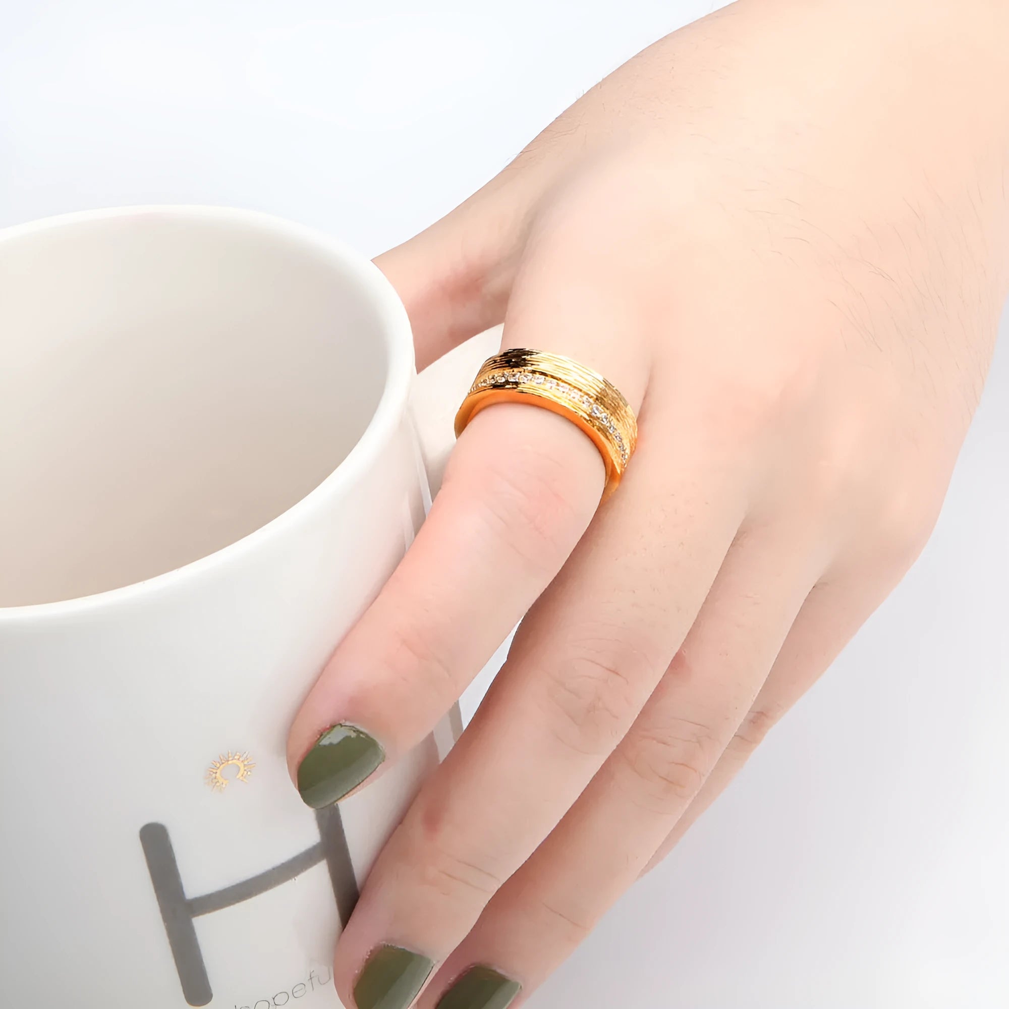 Gold electroplated copper geometric ring with zircon detailing in sizes 6, 7 and 8
