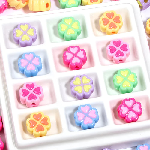 Assortment of 15mm frosted acrylic four-leaf clover beads in pink, yellow, green, blue, purple, and rose red.