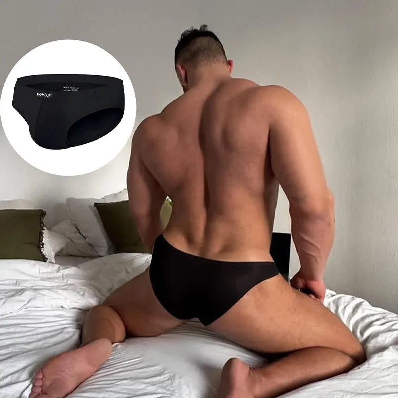 Men's solid colour low-waist polyester briefs on a white background