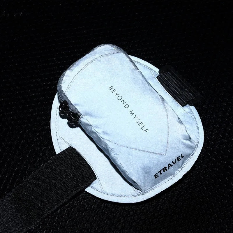 Running arm bag with reflective strips showing 7-inch capacity and polyester lining