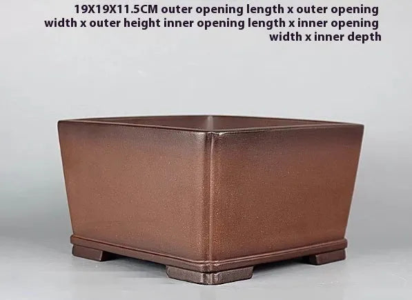 Brown handmade purple clay antique flower pot with classical design measuring 19x19x11.5 cm