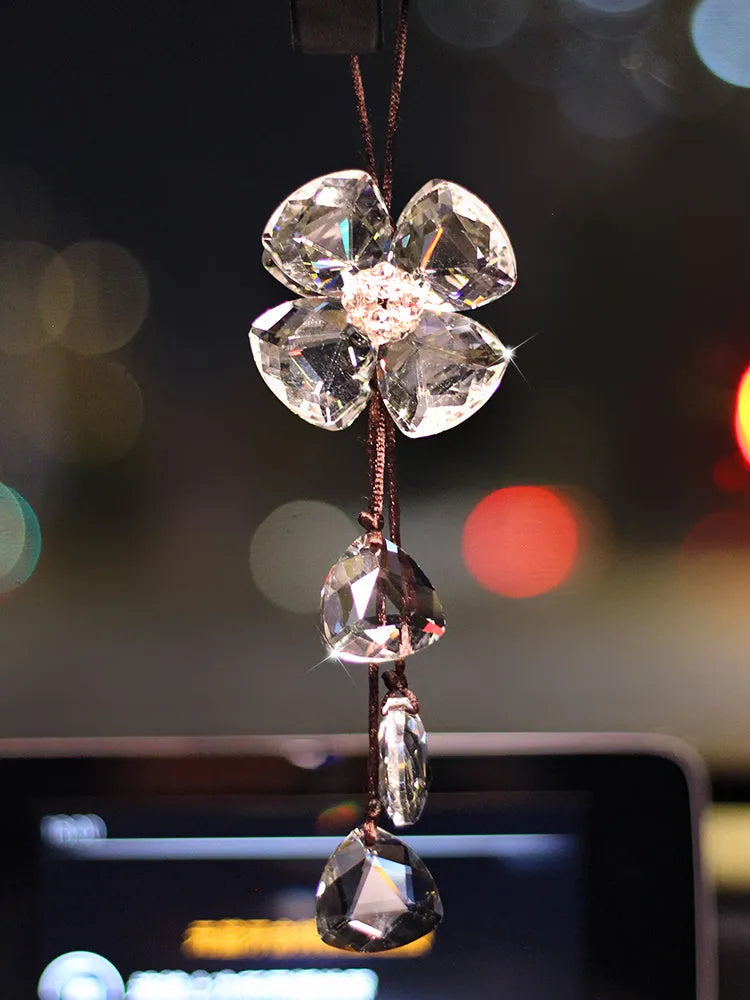 Crystal Four Leaf Grass car pendant decoration in transparent, champagne, black, and shiny finishes, approximately 20 cm long.