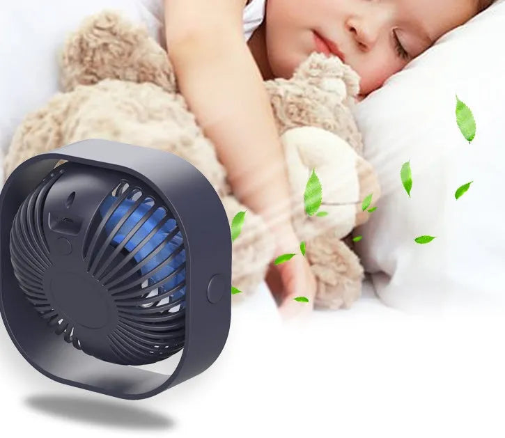 USB charging desk fan with 360-degree rotation in modern alarm clock design