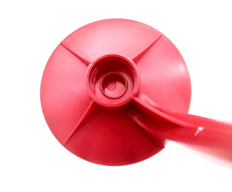 Red Magic Tap soda bottle dispenser attached to inverted 2 litre bottle with push-button mechanism