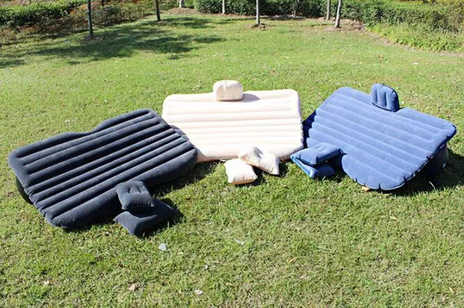 Car inflatable bed with ultra-thickened 0.5mm flocking cloth in Black Wave colour, shown inflated in rear of five-seater car