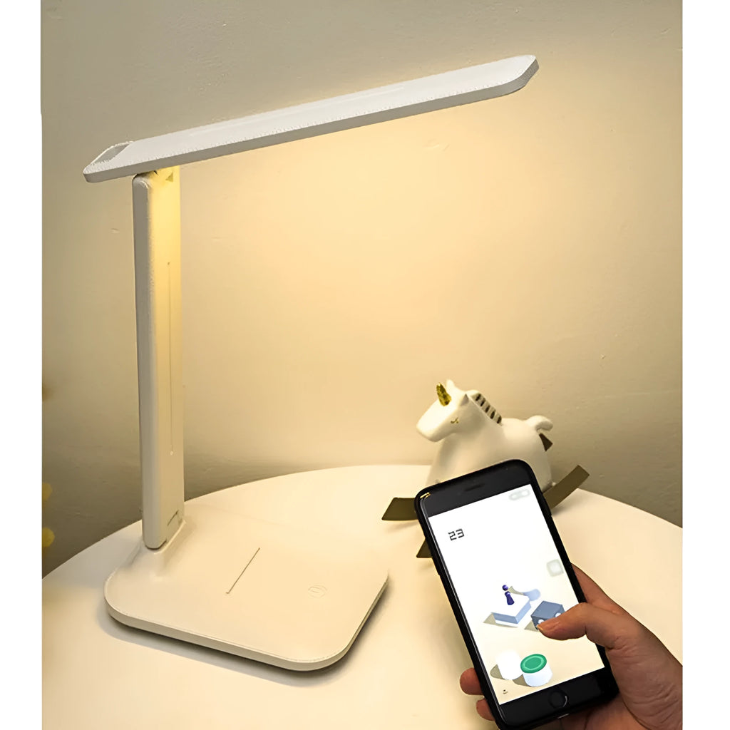 White USB rechargeable bedside lamp with touch dimming control on a wooden table.