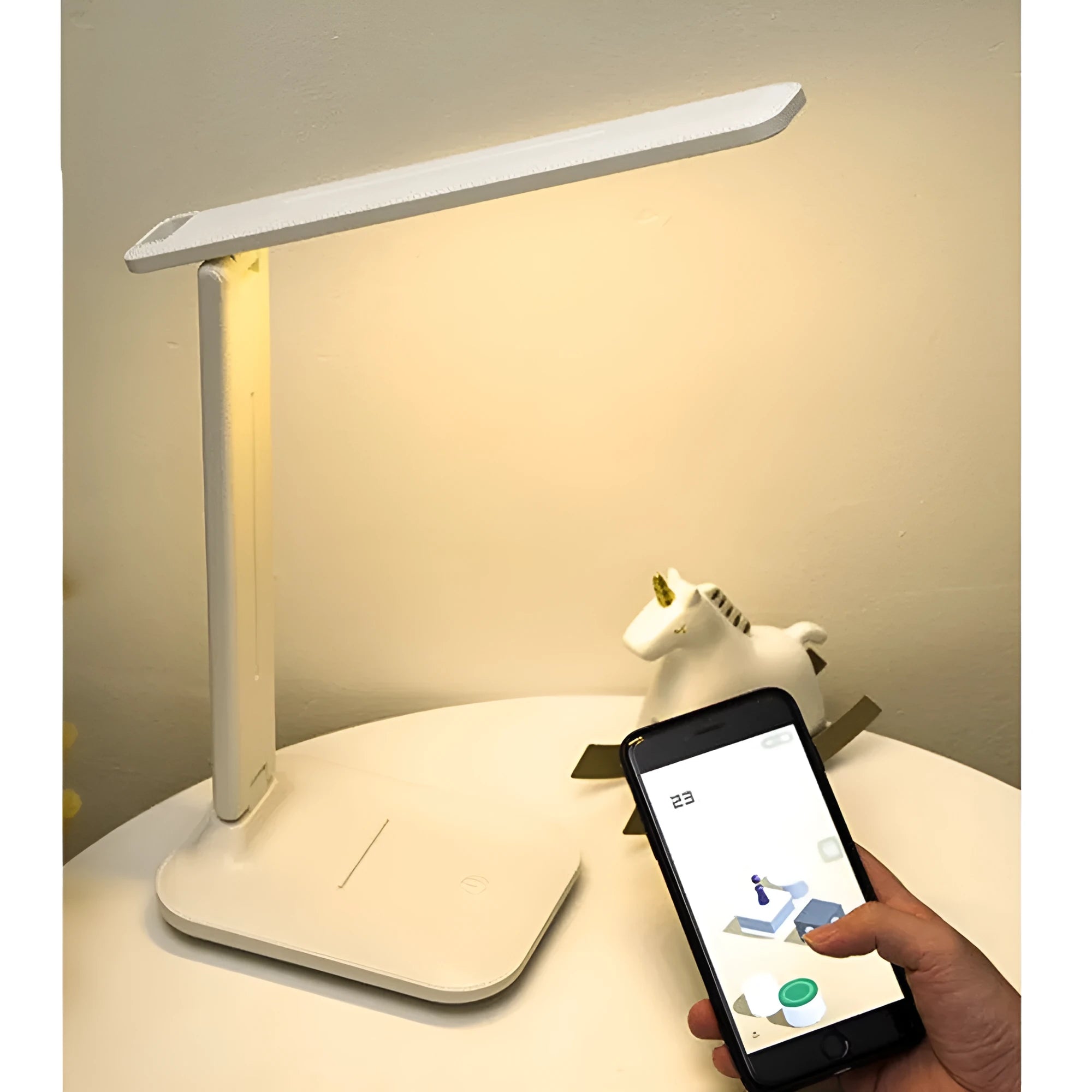 White USB rechargeable bedside lamp with touch dimming control on a wooden table.