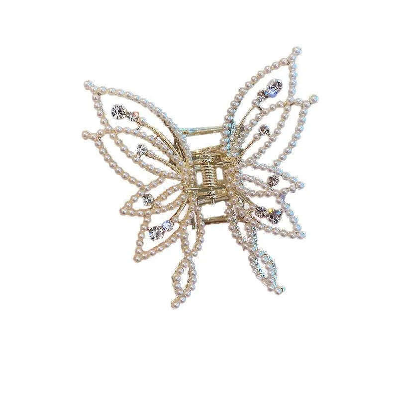 Butterfly-shaped alloy hair clip barrette for women, available in rhinestone or pearl style.