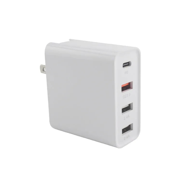 Black four-port USB-C wall charger with UK, EU, US, and AU plug adapters
