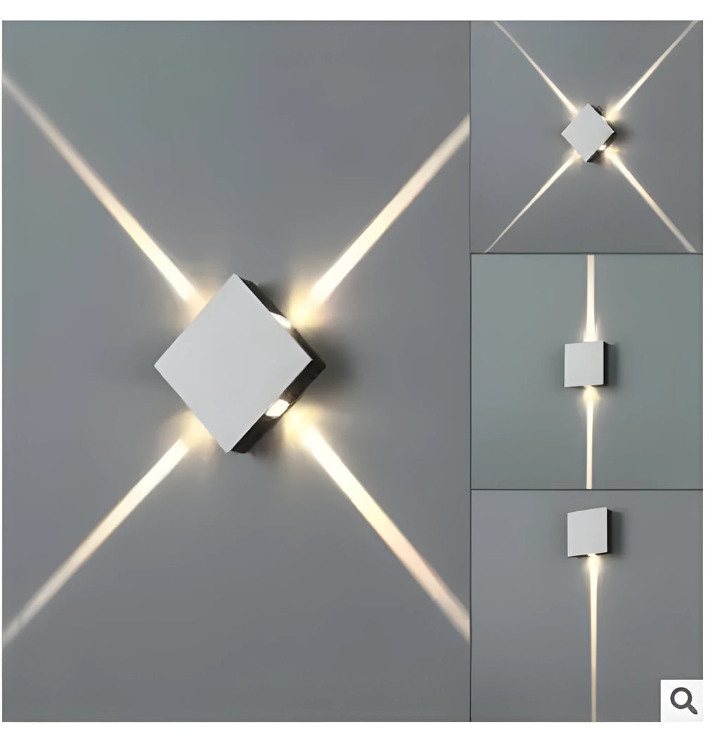 Modern square aluminium and iron LED wall light with warm white glow on a wall