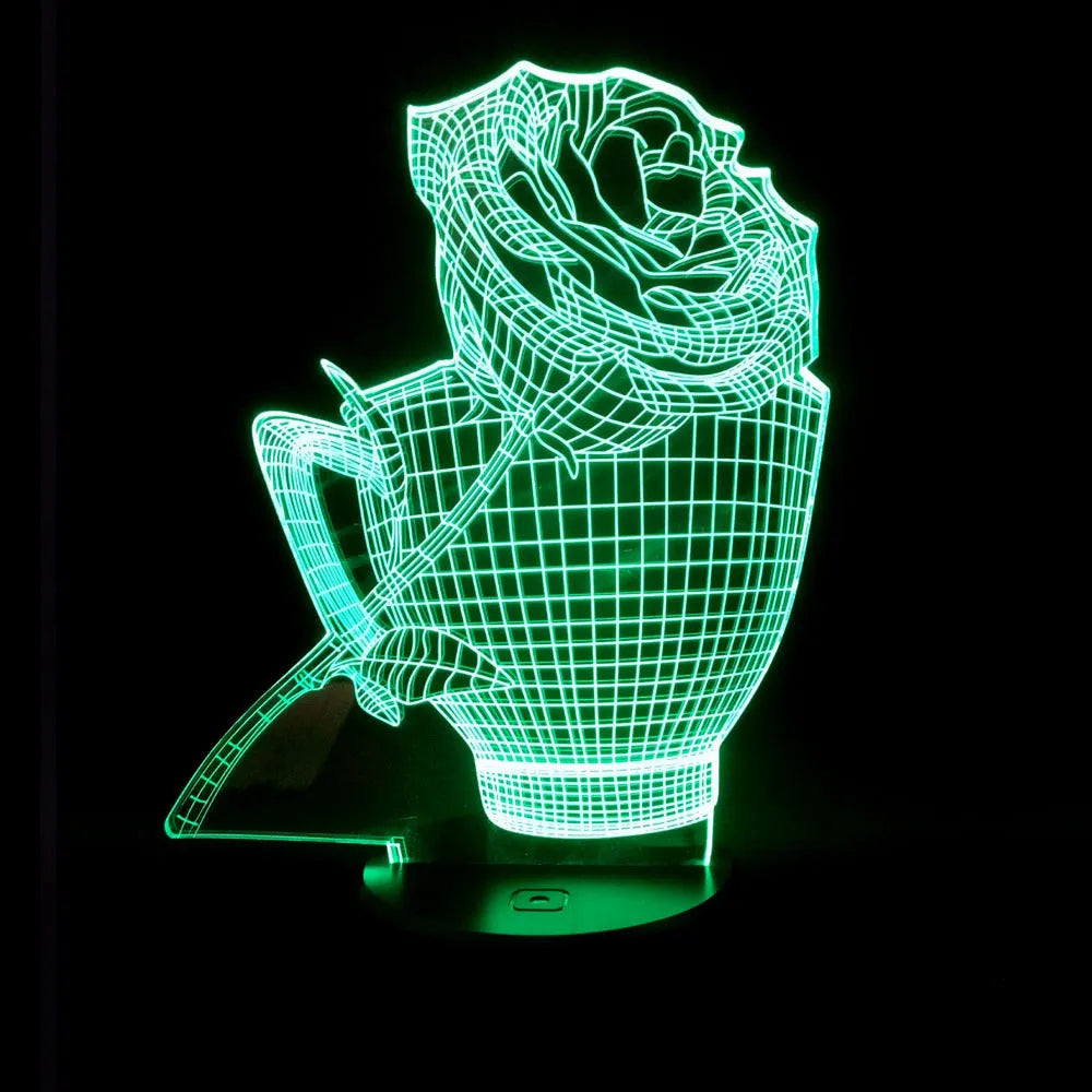 3D rose flower night light with colour-changing LED and remote control on a black base.
