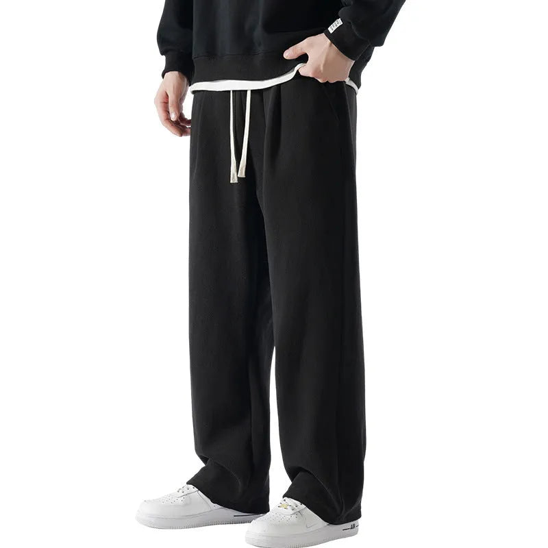 Men's fleece-lined winter casual trousers in apricot colour with drawstring waist and loose fit design