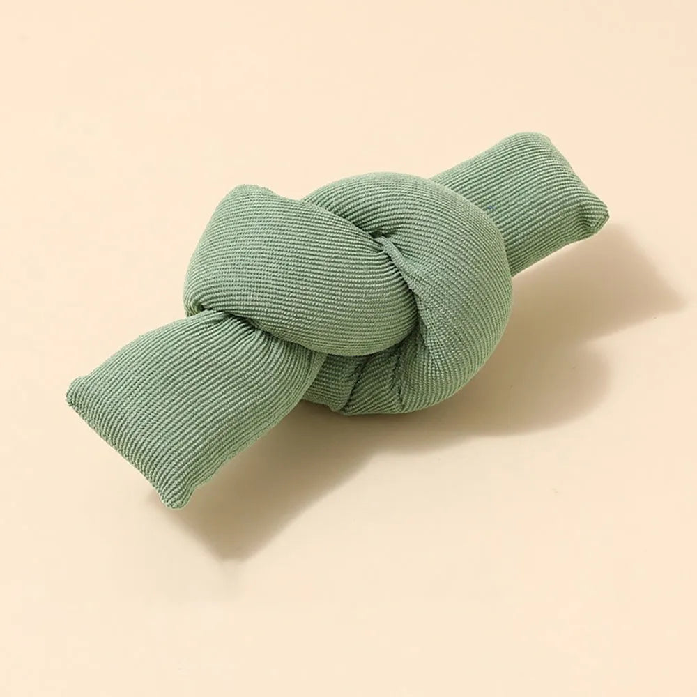 White knotted cotton rope dog toy with sturdy knots for tug of war and chewing