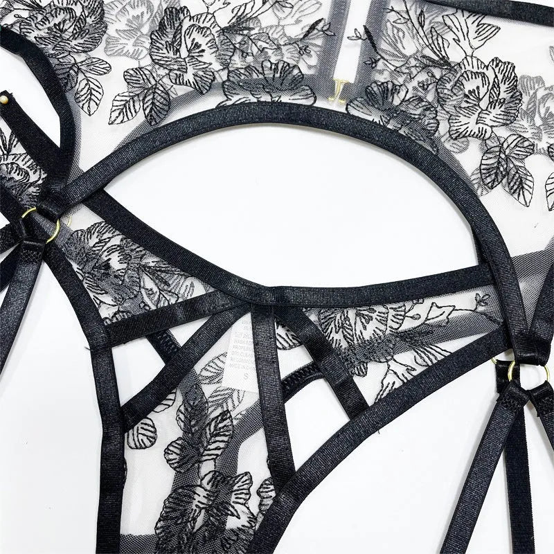 Women's black lace three-piece set with floral print showing top, pants and waist ring on hanger