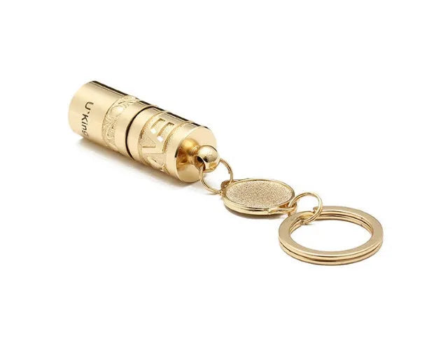 Gold zinc alloy waterproof LED flashlight keychain showing 7cm compact design