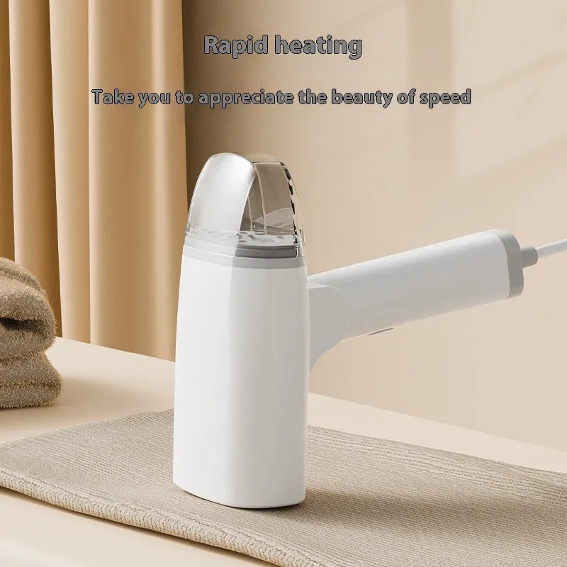 Blue handheld garment steamer with water tank and mechanical controls for ironing clothes