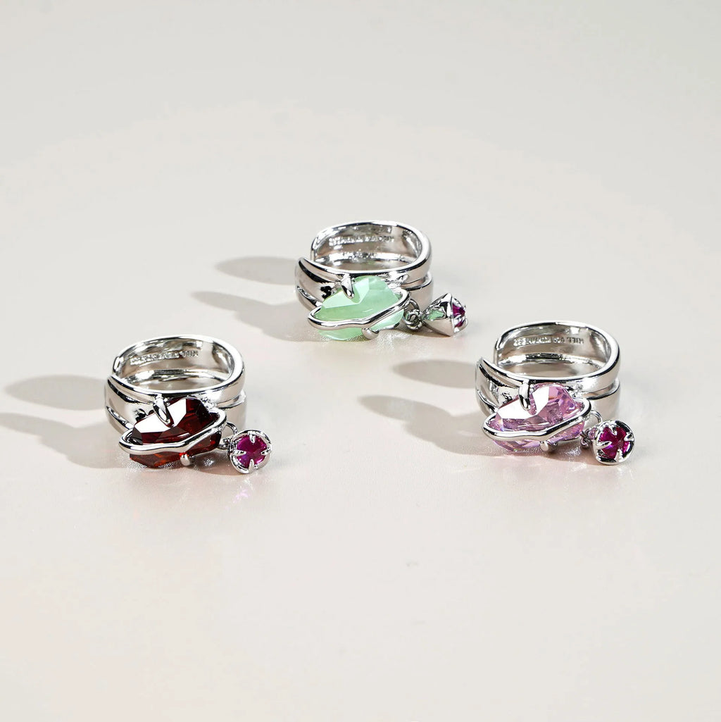 Peach blossom crystal clip-on earrings with platinum-plated copper base and gold-plated inlay in opal colour