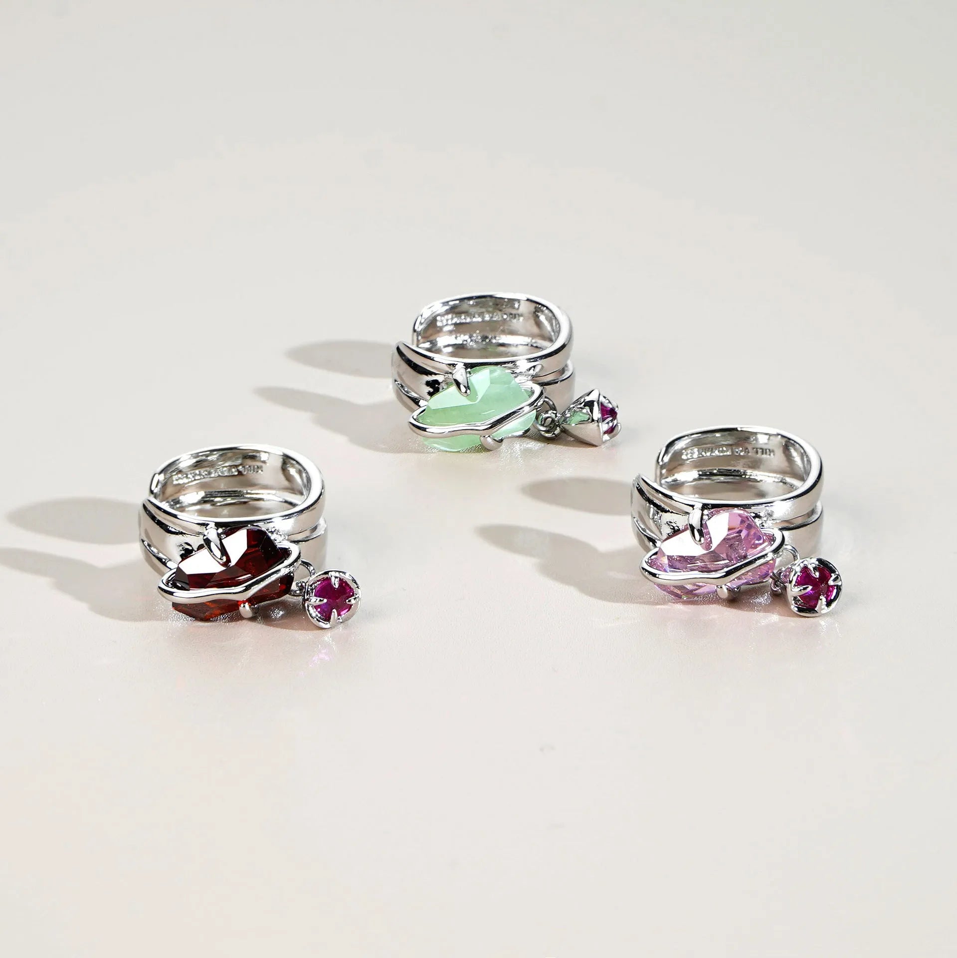 Peach blossom crystal clip-on earrings with platinum-plated copper base and gold-plated inlay in opal colour