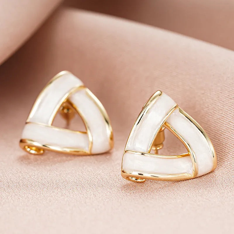 Women's yellow gold geometric triangle stud earrings with inlaid zircon on copper base