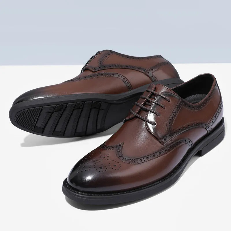 Men's black and brown brogue Oxford lace-up business shoes on a white background.
