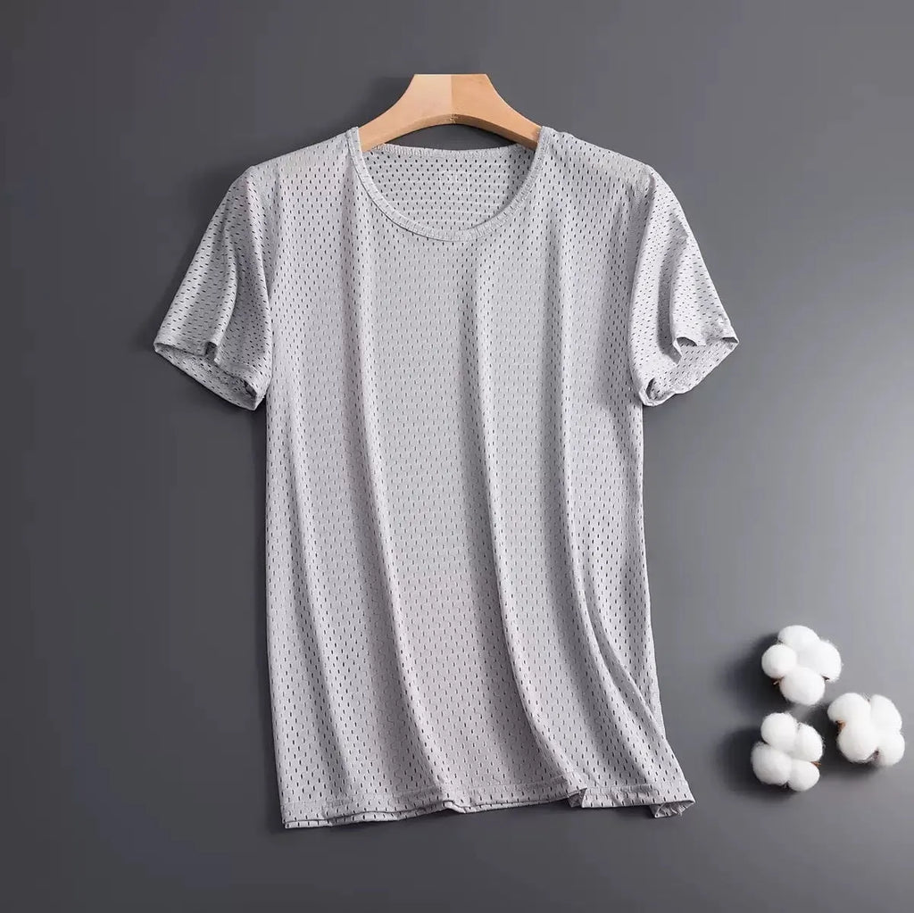 Man wearing a solid colour ice silk short sleeve t-shirt with a loose crew neck fit