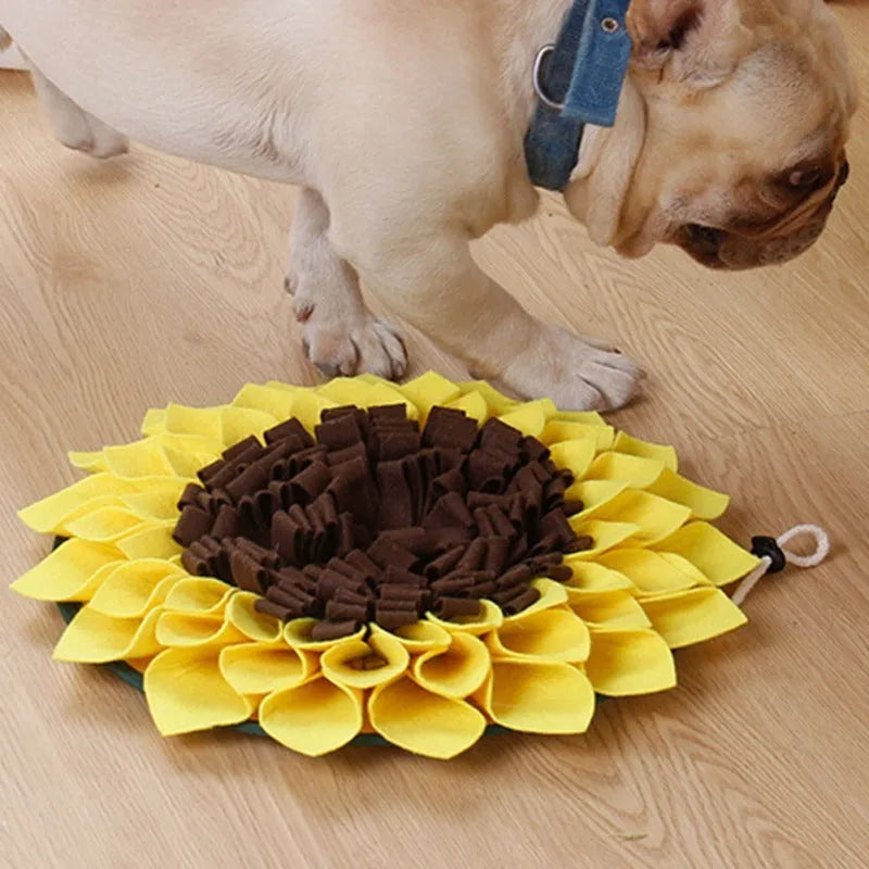 Yellow sunflower-shaped snuffle mat with layered fleece and felt strips for hiding dog treats