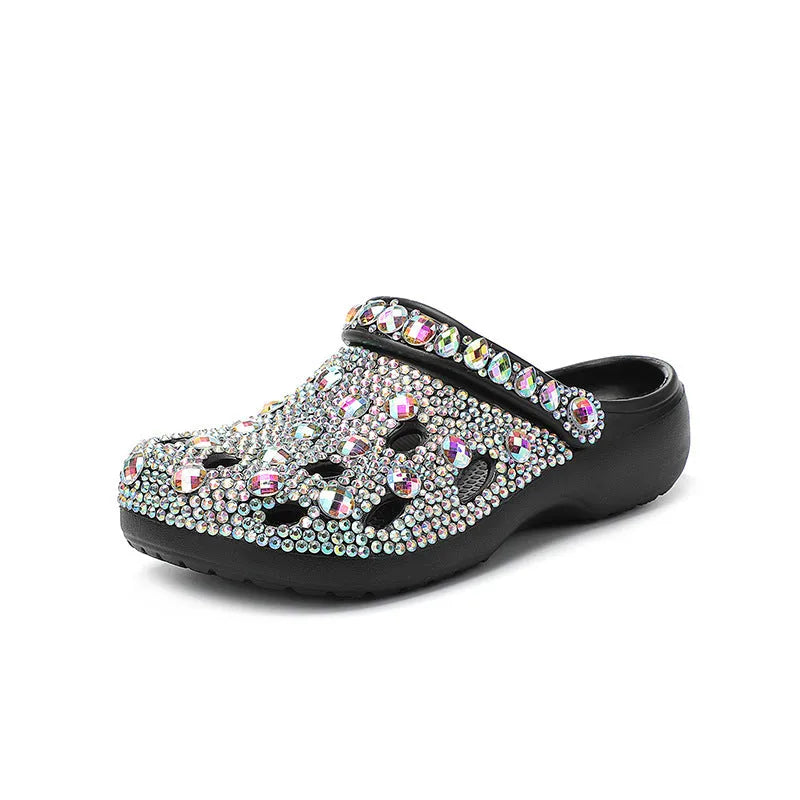 Black women's platform casual sandals with rhinestone detail on an EVA upper and sole.