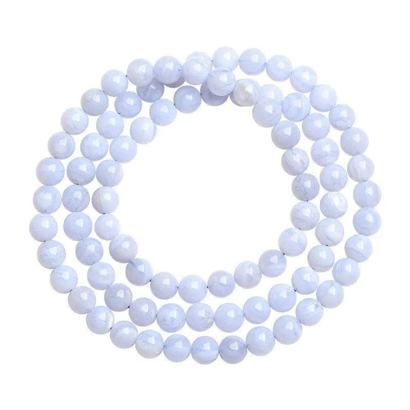 Blue striped agate bracelet with scattered beads showing multi-circle pattern