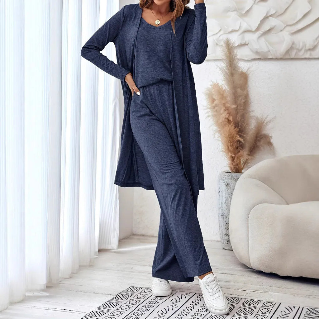 Blue women's three-piece suit set showing long cardigan, trousers, and sling top