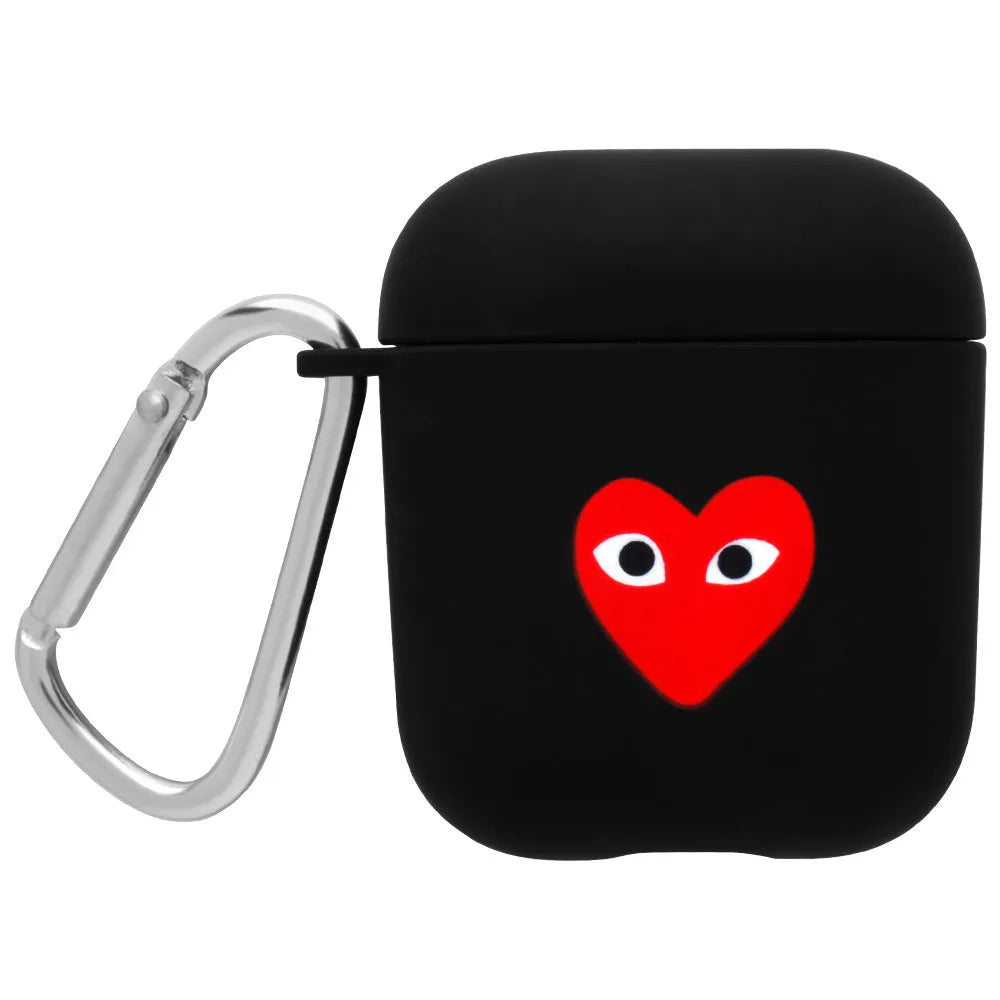 Black and pink AirPods case covers with smiley face and flower decorative motifs