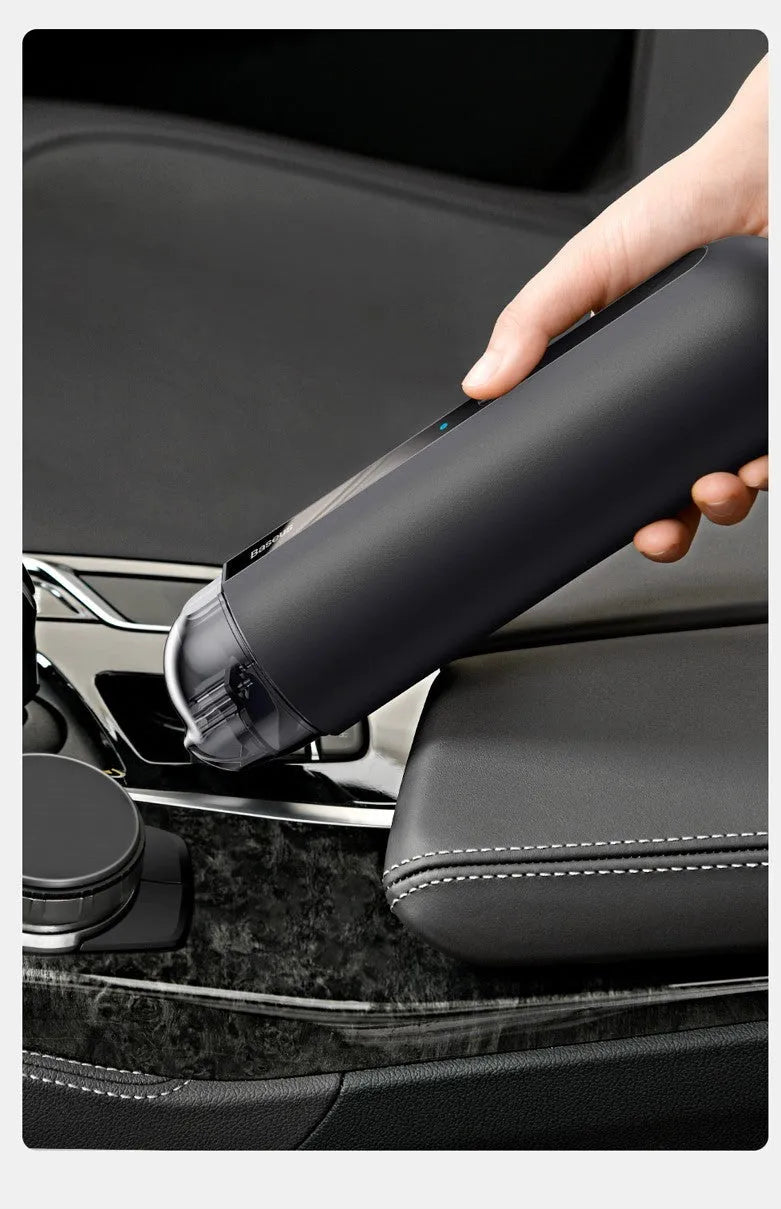 Baseus handheld cordless car vacuum cleaner in black, white, or green with suction and blow functions.