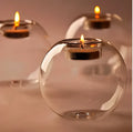 Round clear hollow glass candle holder for hot glass craft on a table