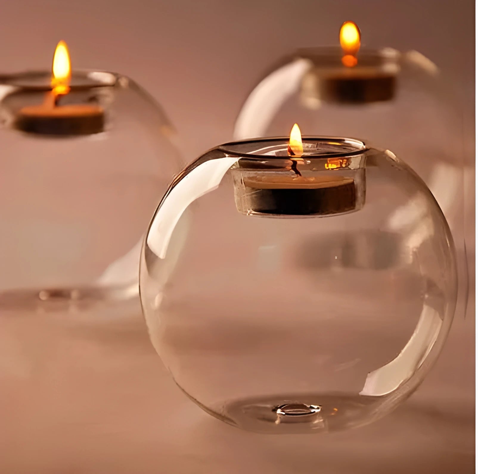 Round clear hollow glass candle holder for hot glass craft on a table